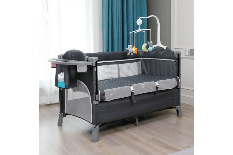 vs. Crib What Does Baby Actually Need? Wayfair